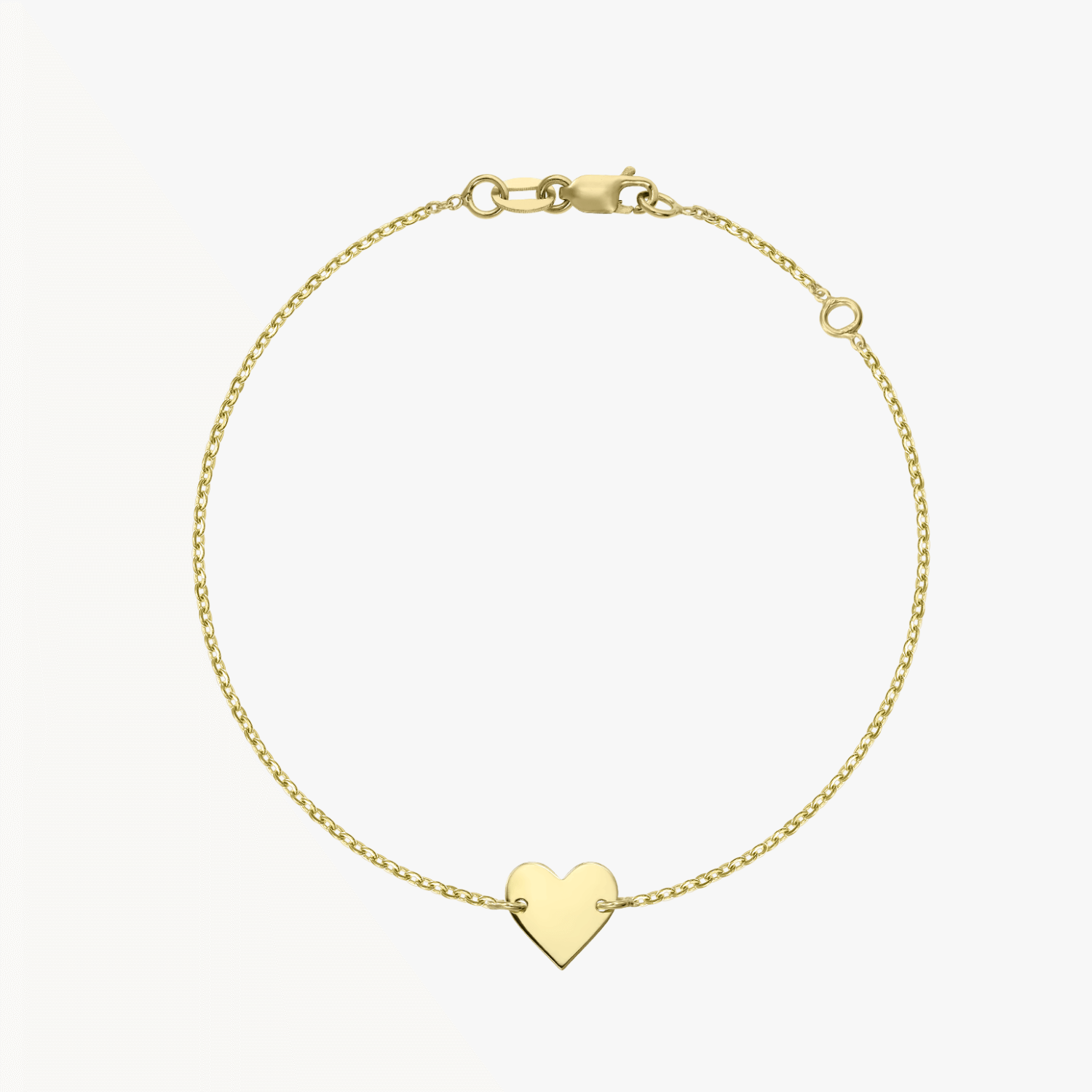Bracelet cœur en or 14K sur fond blanc