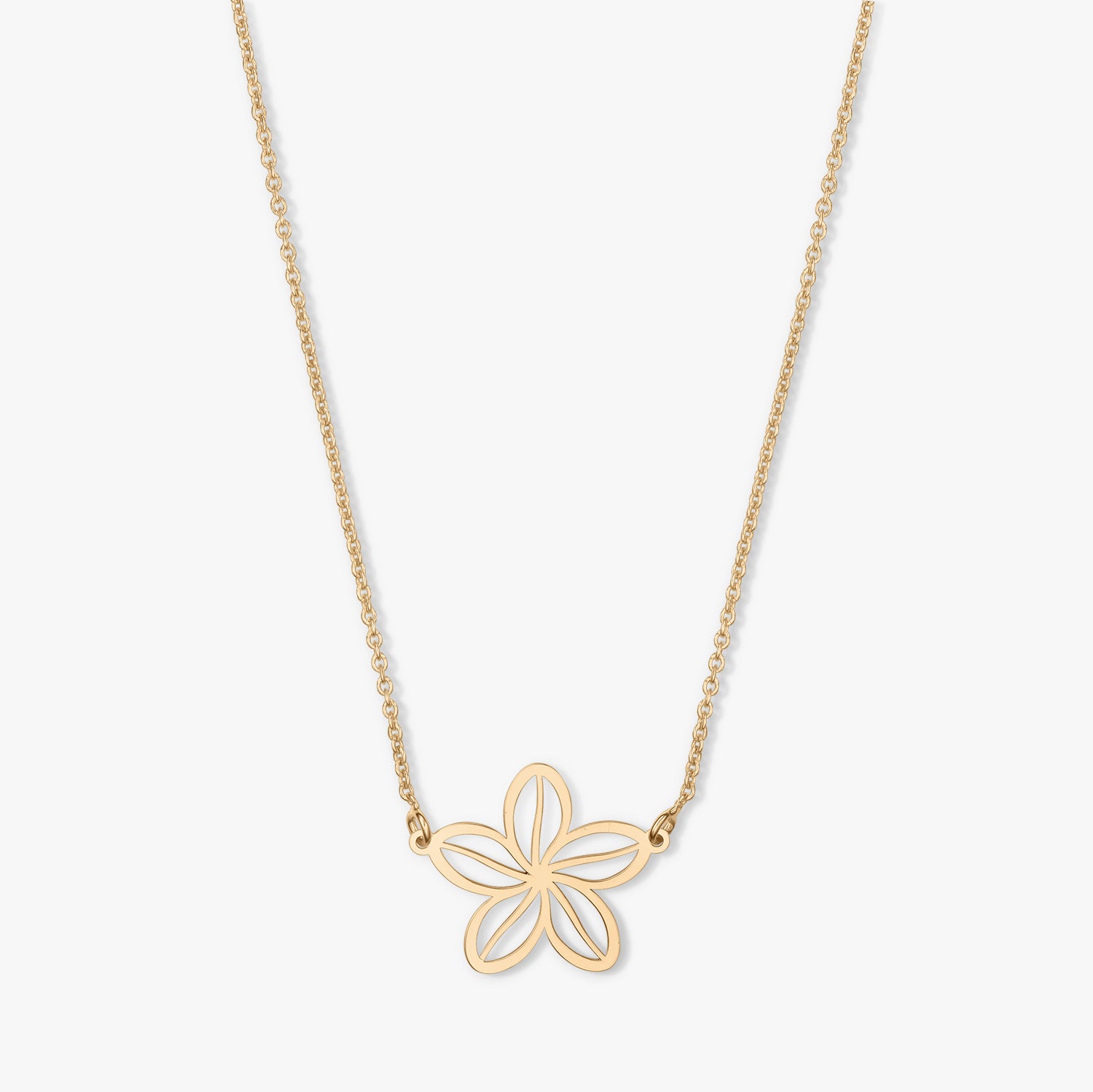 Collier en or avec un pendentif en forme de fleur sur fond blanc.