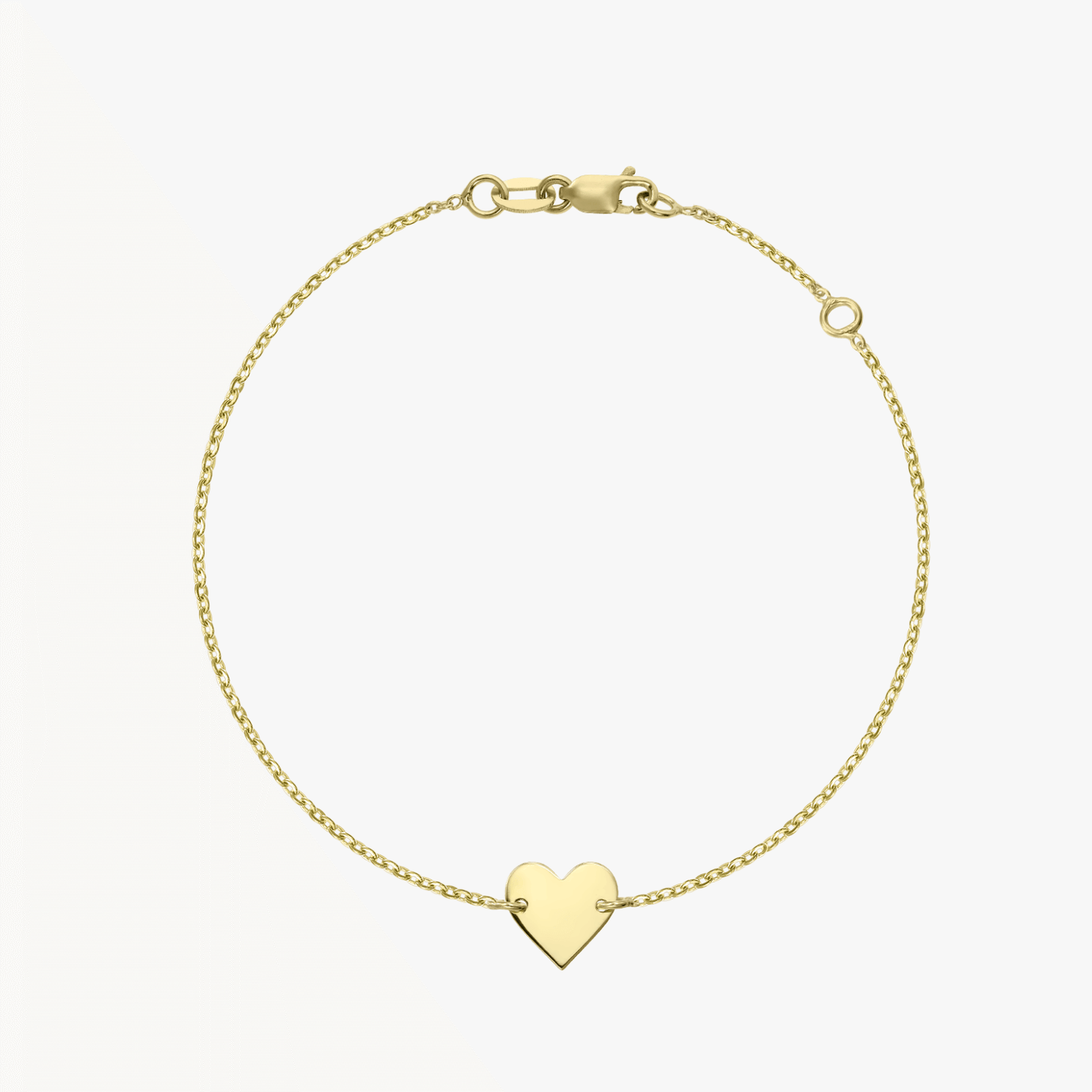 Bracelet cœur en or 14K sur fond blanc